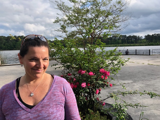 Jean Sullivan, registered dietitian, in front of a lake