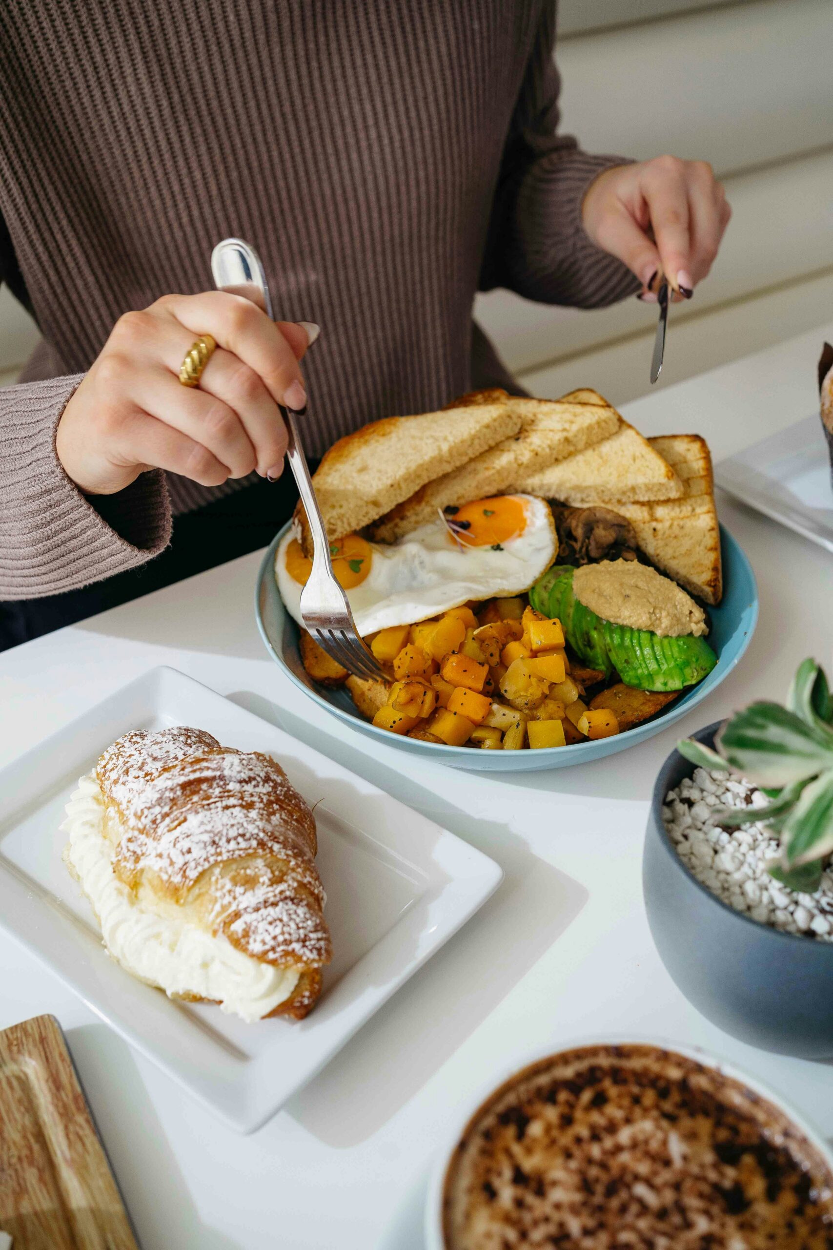 Someone eating a fear food in the action stage of eating disorder recovery